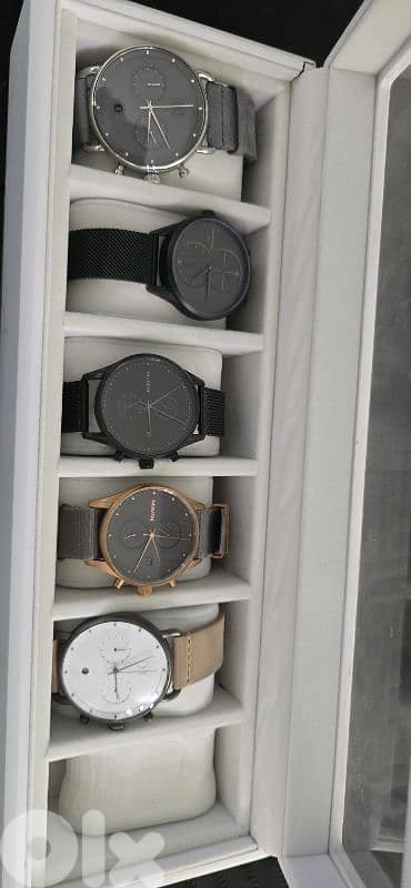 4 MVMT watches and 1 omorfia watch and box 0