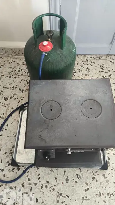 دفاية غاز مع ساعة وصينية