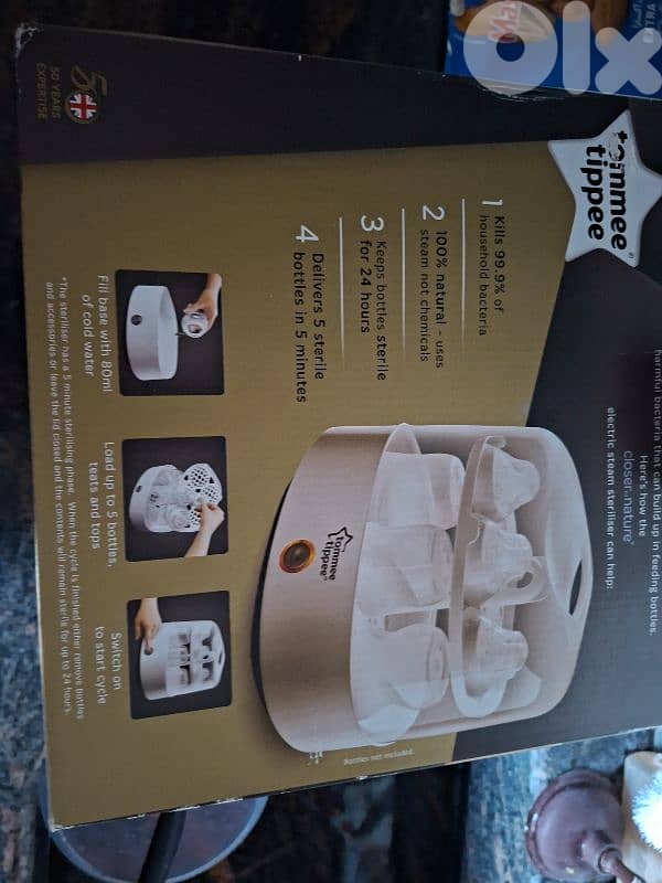 Tommee Tippee Sterilizer + free baby clothes 2