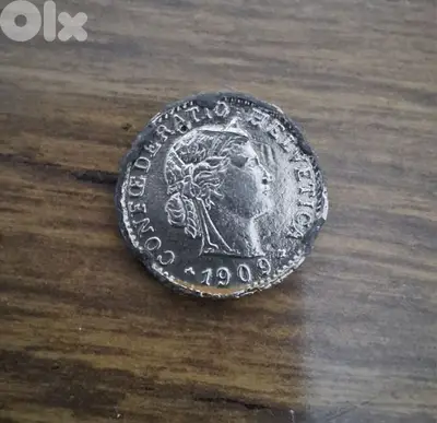 عملة سويسرية من فئة 20 سنتيمًا صدرت عام 1909،