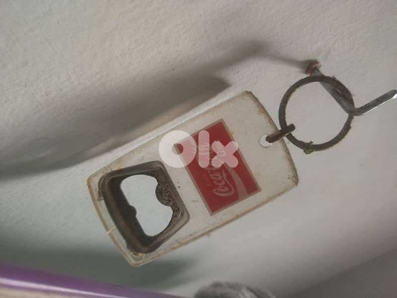 vintage coca cola bottle opener 0