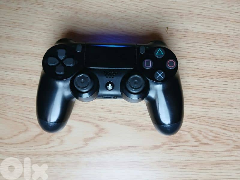 مسكة ps4 اصلية 0