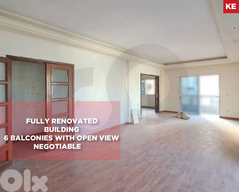 fully renovated building,6 balconies -open view- Badaro REF#KE126948 0