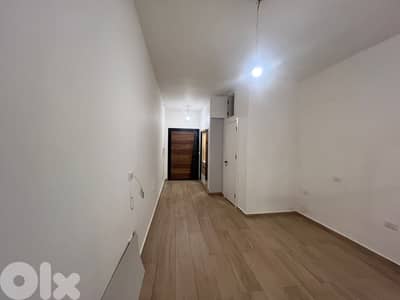 L20273 - Renovated Apartment With Terrace For Sale in Ain Al Remmaneh