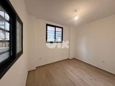 L20273 - Renovated Apartment With Terrace For Sale in Ain Al Remmaneh