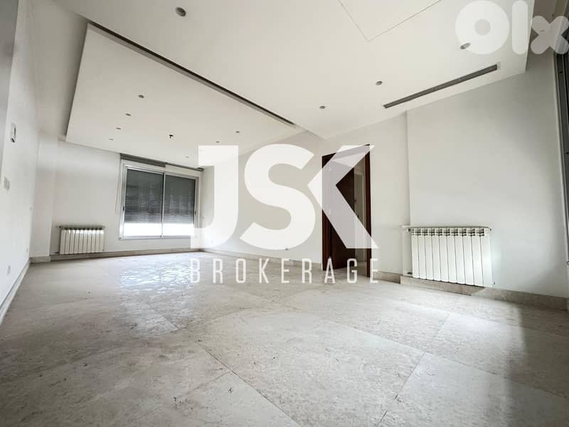 L20283 - Spacious Apartment with Open City View For Sale in Achrafieh 0