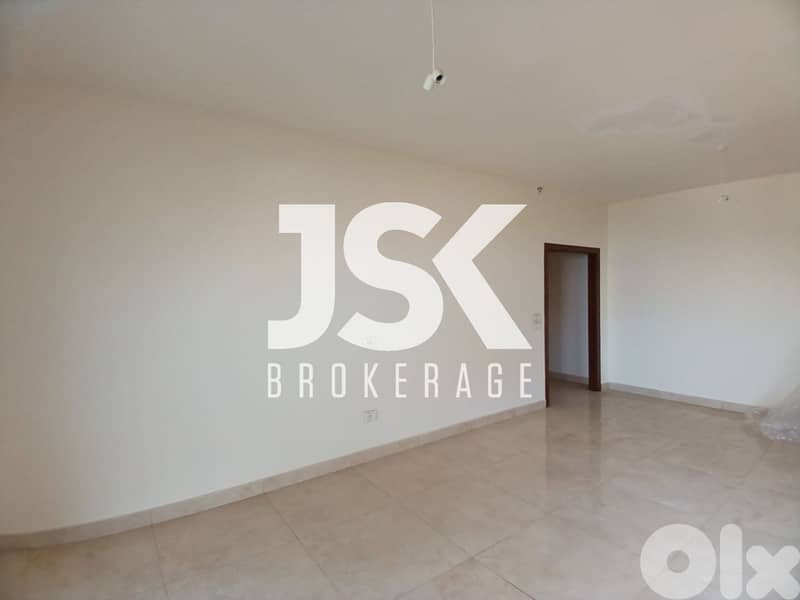 L20310 - Spacious Apartment With Terrace For Sale in Baabdat 0