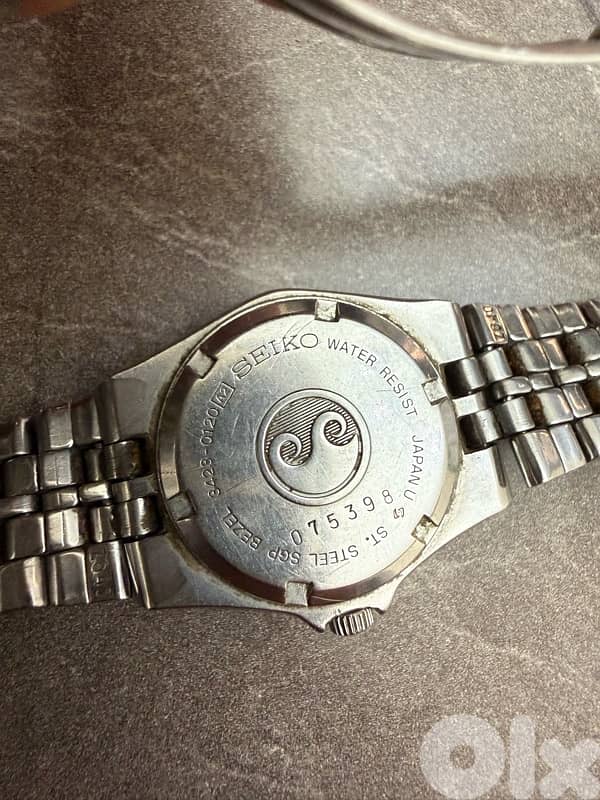 Vintage Seiko "Royal Oak" SQ Sports 100 watch 1