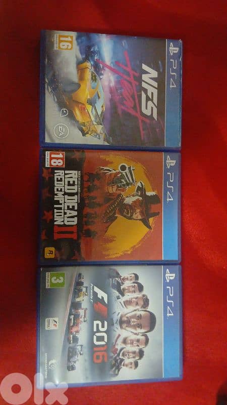 red dead redemption 2, need for speed heat, f1 2016 CD disk 0