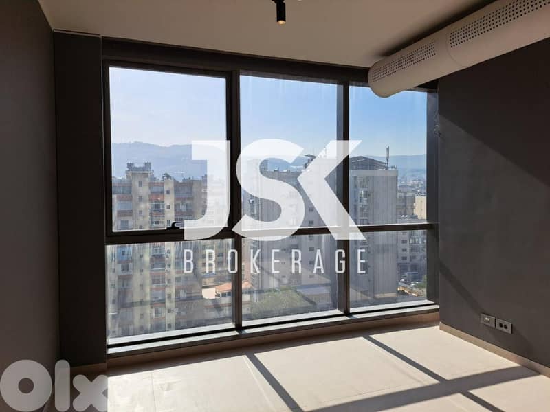 L20338-An Open Space Office in A Well-Known Tower For Rent in Dekweneh 0