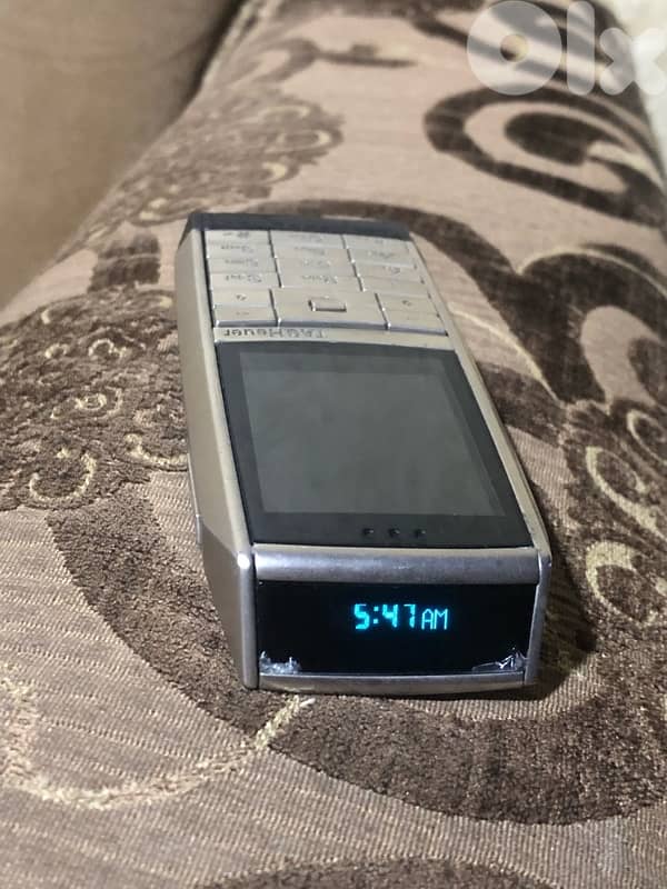 A genuine Swiss-made Tag Heuer phone that works well but need charger 1