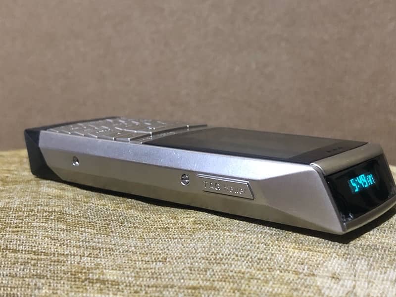 A genuine Swiss-made Tag Heuer phone that works well but need charger 5