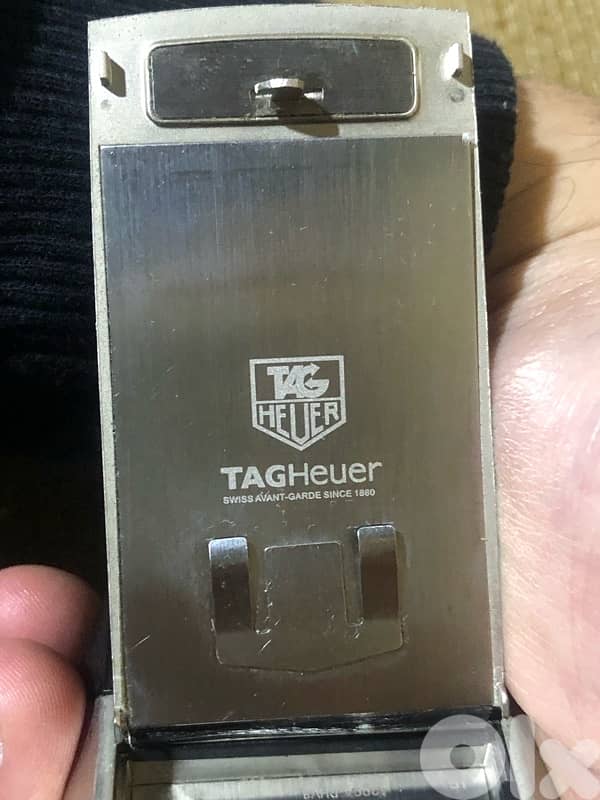 A genuine Swiss-made Tag Heuer phone that works well but need charger 11