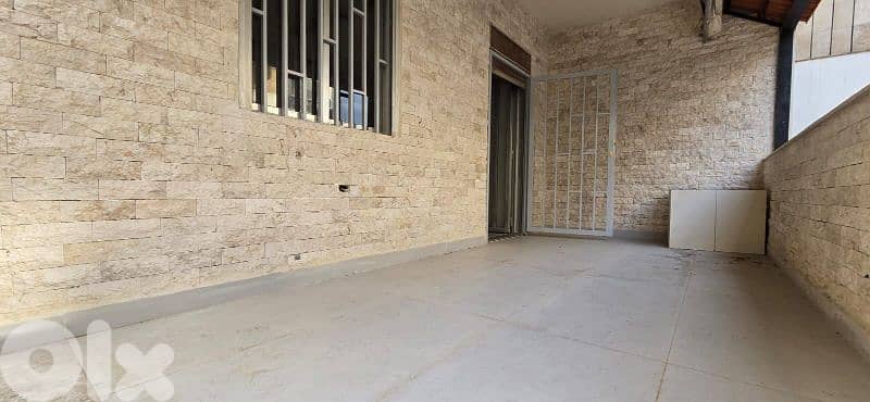 Apartment with terrace for sale in Ballouneh 0