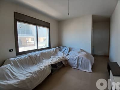 L18427 - Spacious Decorated Apartment For Sale In Elissar