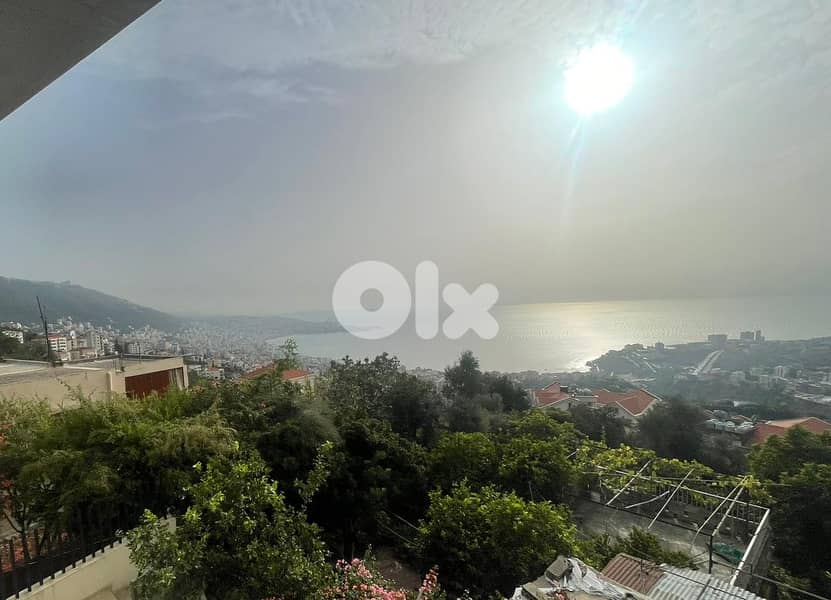 840 SQM Land with Old House in Ghazir with a Panoramic Sea View 0