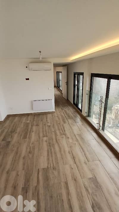Luxurious Penthouse for Sale in Achrafieh, Pool, Terrace, open view.