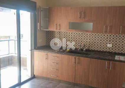 Prime Location New Apartment in Dekwaneh, Metn with a Balcony.