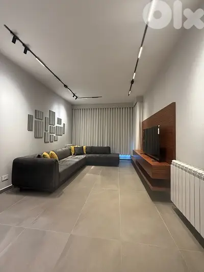 A Modern Furnished apartment for rent in Achrafieh in a very nice Bldg