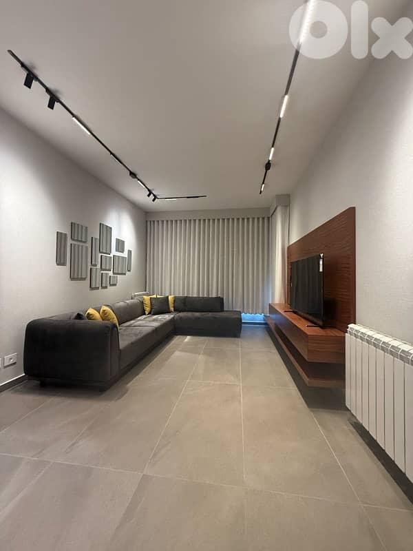 A Modern Furnished apartment for rent in Achrafieh in a very nice Bldg 0