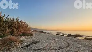 GMK167YA - Beach front land for sale in okaibe - أرض مطلة