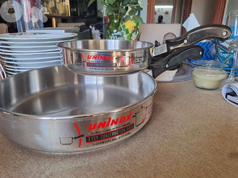2 pans 20 cm and 25 cm stainless steel and aliminium 0