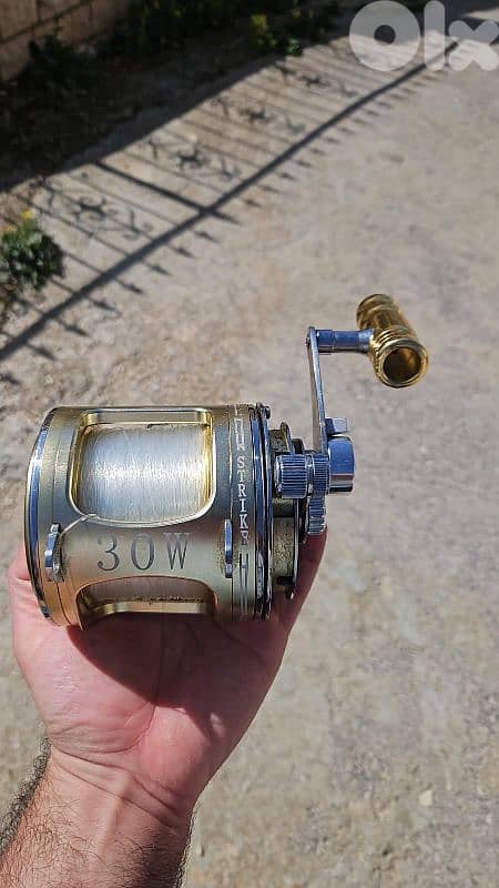 Fishing- 2x Tuna Rods + reel 2