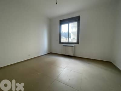 GMK234Y - Apartment For Sale In Ballouneh - شقة للبيع في بلونة