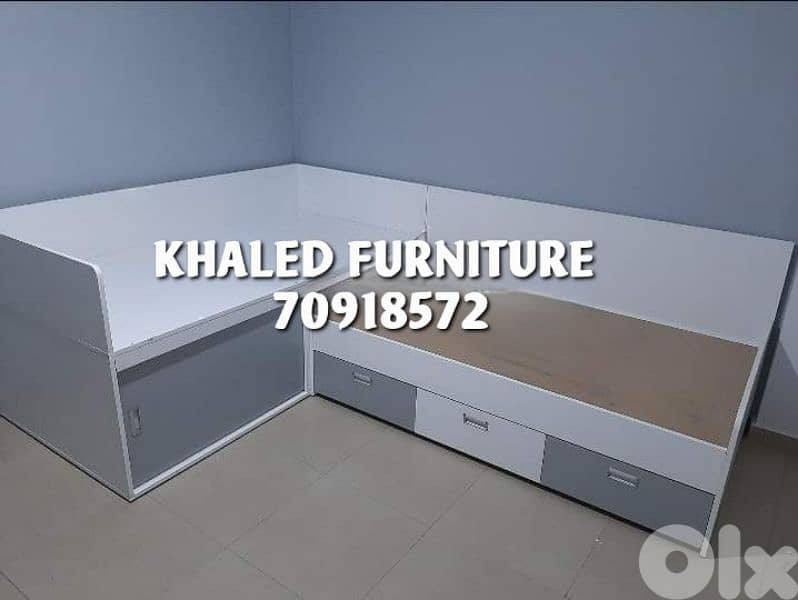 Two corner beds with drawers and a wardrobe underneath high quality 0