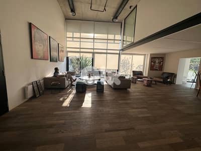 Amazing high ceiling loft designed with terrace