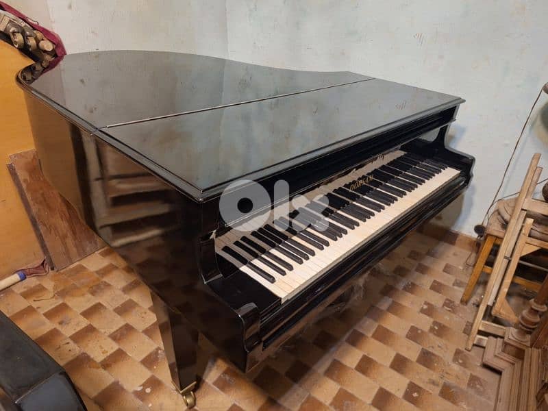 piano baby grand glossy black coloured tuning warranty 7