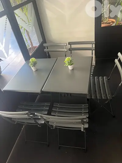 3xoutdoor steel tables and 7xchairs
