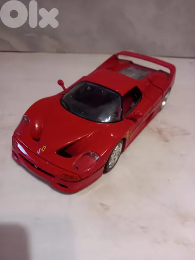 Burago 1:18 scale diecast model of a 1995 Ferrari F50 in red.