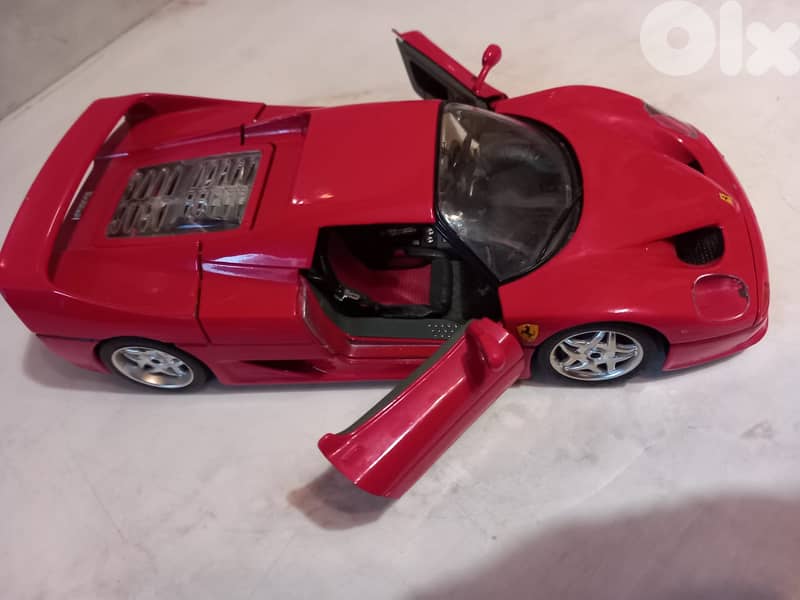 Burago 1:18 scale diecast model of a 1995 Ferrari F50 in red. 2