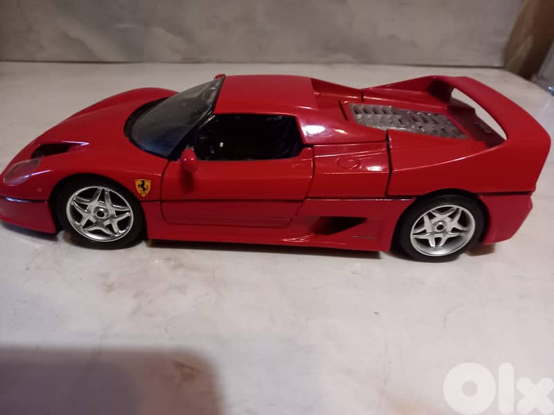 Burago 1:18 scale diecast model of a 1995 Ferrari F50 in red. 4