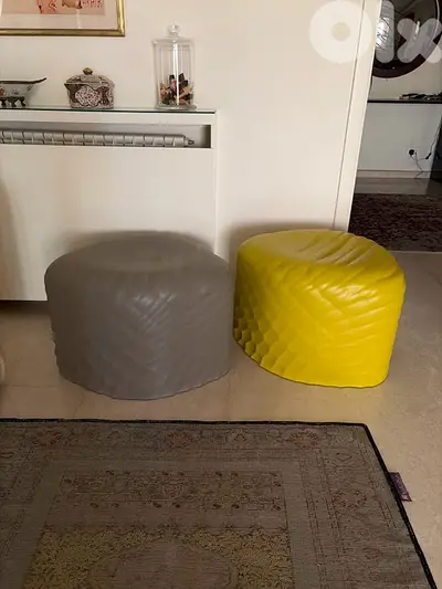 2 leather seats (poufs) from Altus Gallery