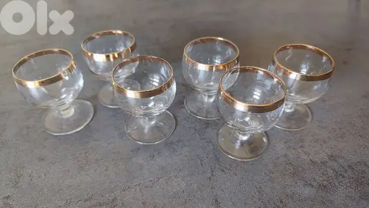 vintage gold-rimmed stemmed glasses