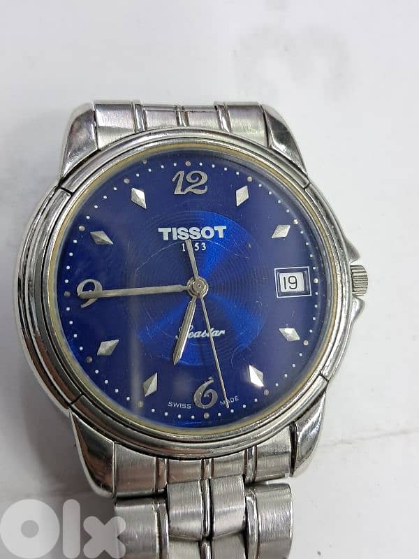 TISSOT  swiss 03032462 0