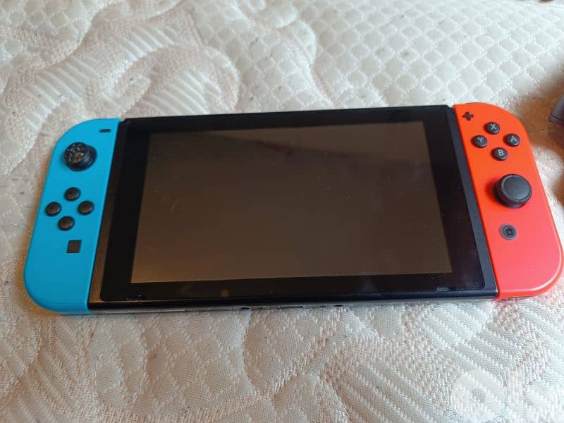 Urgently selling Nintendo Switch + 3 Games + Accessories (64GB SD) 4