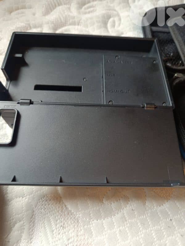 Urgently selling Nintendo Switch + 3 Games + Accessories (64GB SD) 10