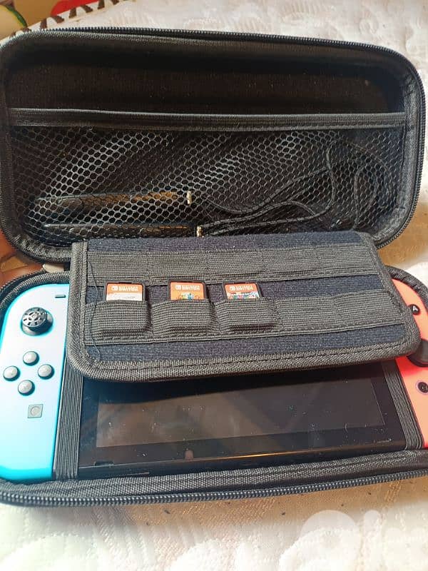 Urgently selling Nintendo Switch + 3 Games + Accessories (64GB SD) 14