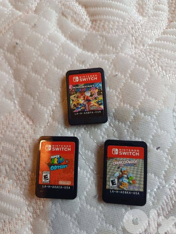 Urgently selling Nintendo Switch + 3 Games + Accessories (64GB SD) 15