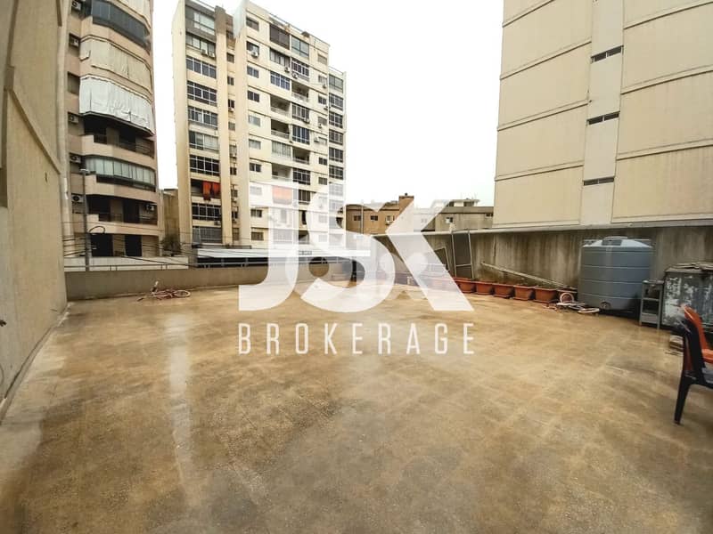 L20787 - 2-Bedroom Apartment with Terrace For Sale in Bouchrieh 0