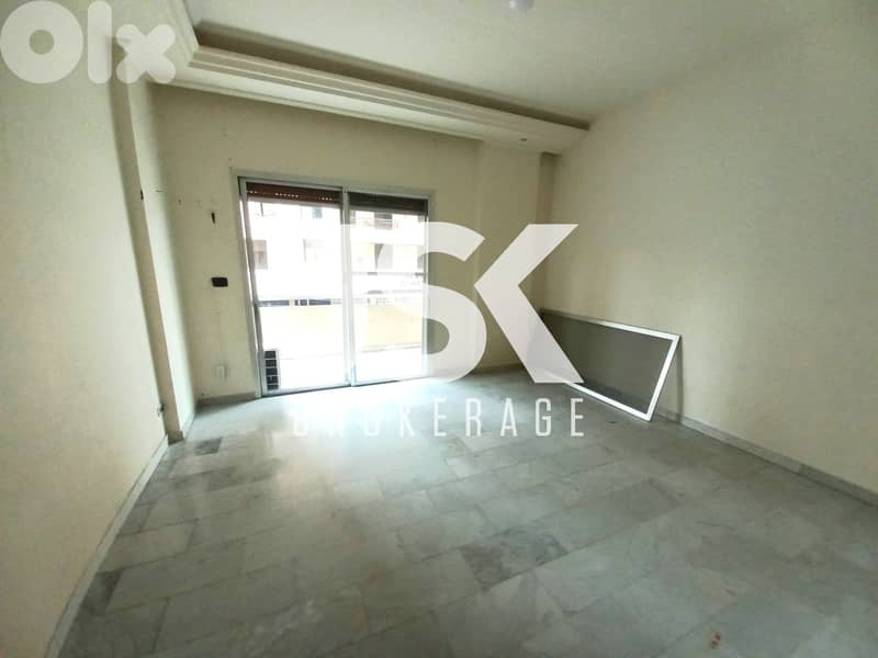 L20788 - 3-Bedroom Apartment with Terrace For Sale in Bouchrieh 0