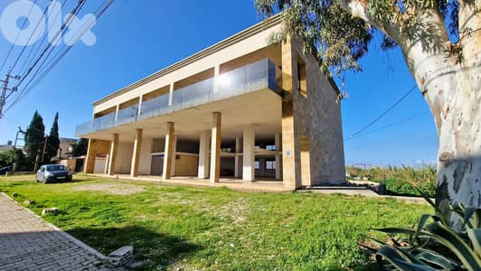 L15671 - Prime location in Batroun ! 125 sqm Warehouse for Rent