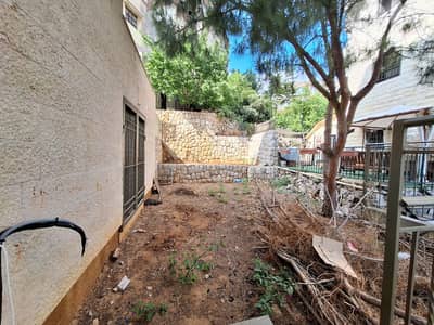 L18611 - Spacious Apartment with Garden For Rent in Jeita