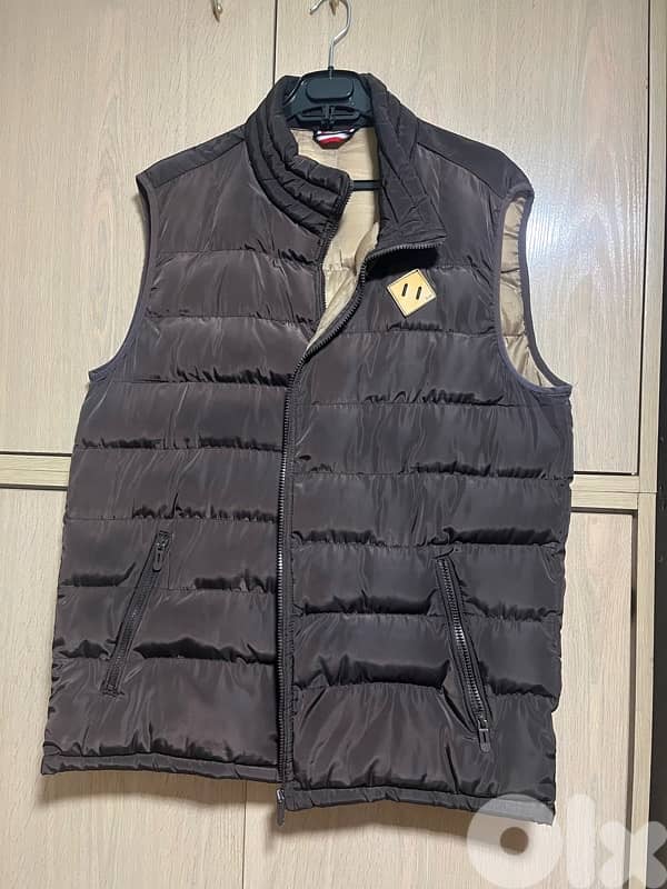 moustache jacket no sleeves 0