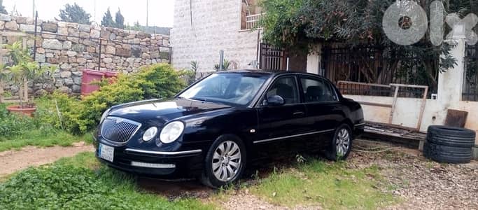 Kia Oprius 2009 1200$