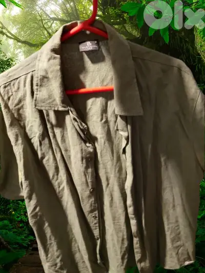 green T-shirt.