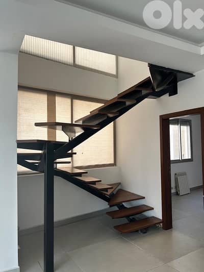 Lofty double level achrafieh prime location